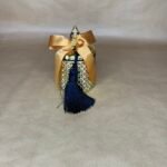 Χρυσή φοντανιέρα γούρι με μπλε φούντα