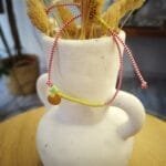 Μαρτάκι με χρυσό στοιχείο και λαχανί κορδόνι και χάντρα